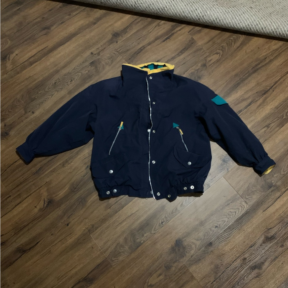 Fisherman style bomber jacket. Neon yellow, navy and blue